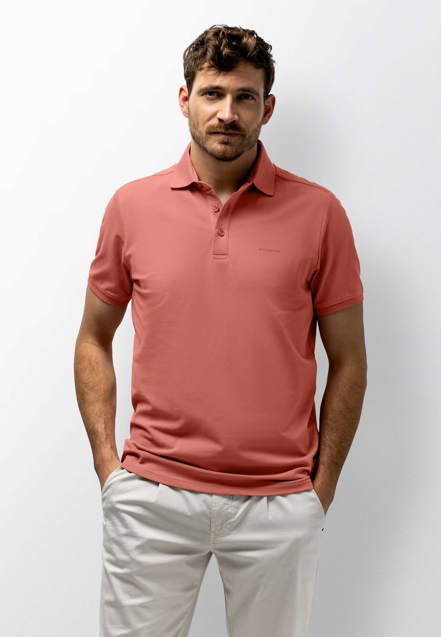 Polo piqué uni stretch - koraalrood